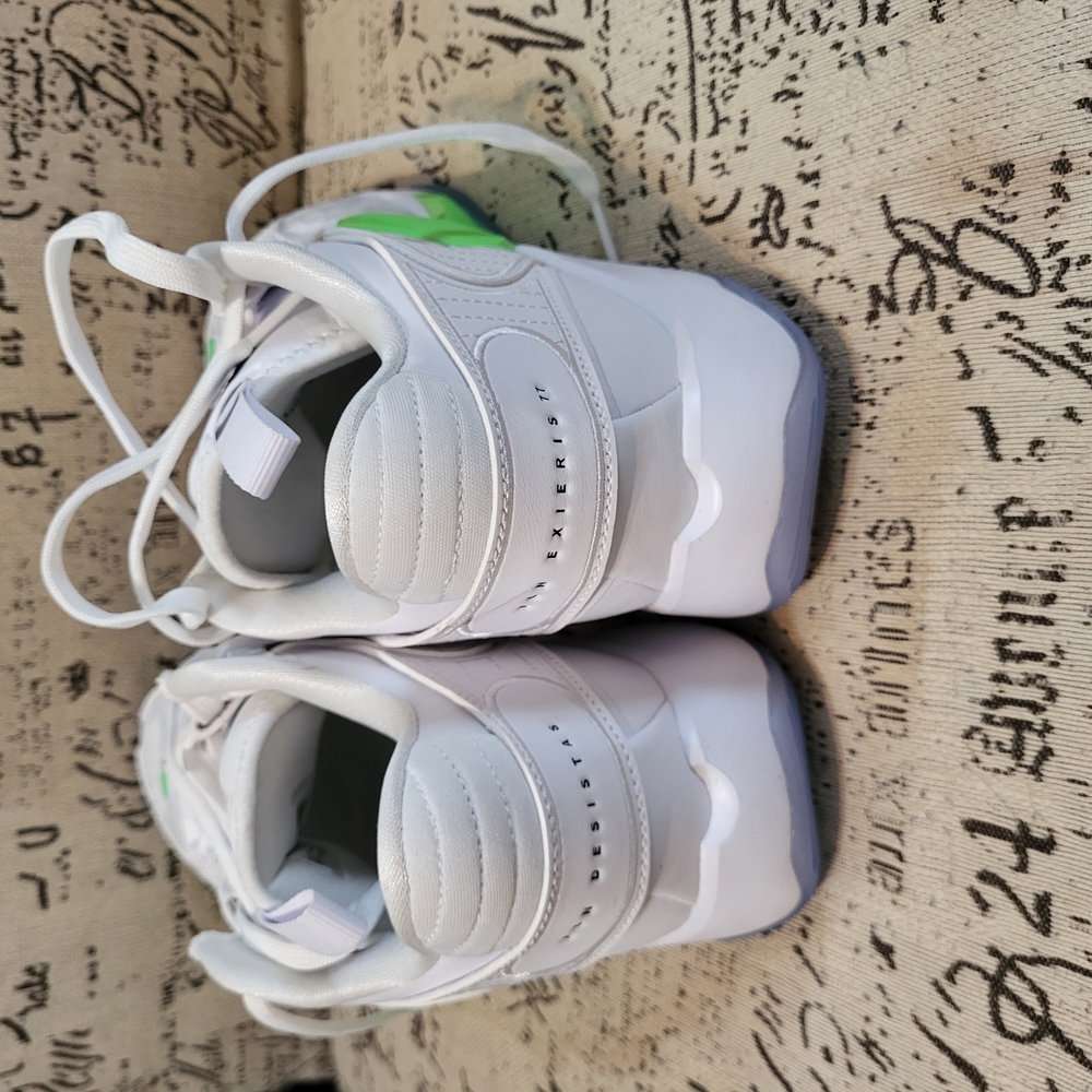 Nike White and Green Athletic Shoes with Minimalist Design